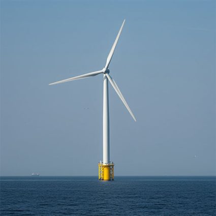 Offshore wind turbine on a clear sunny day